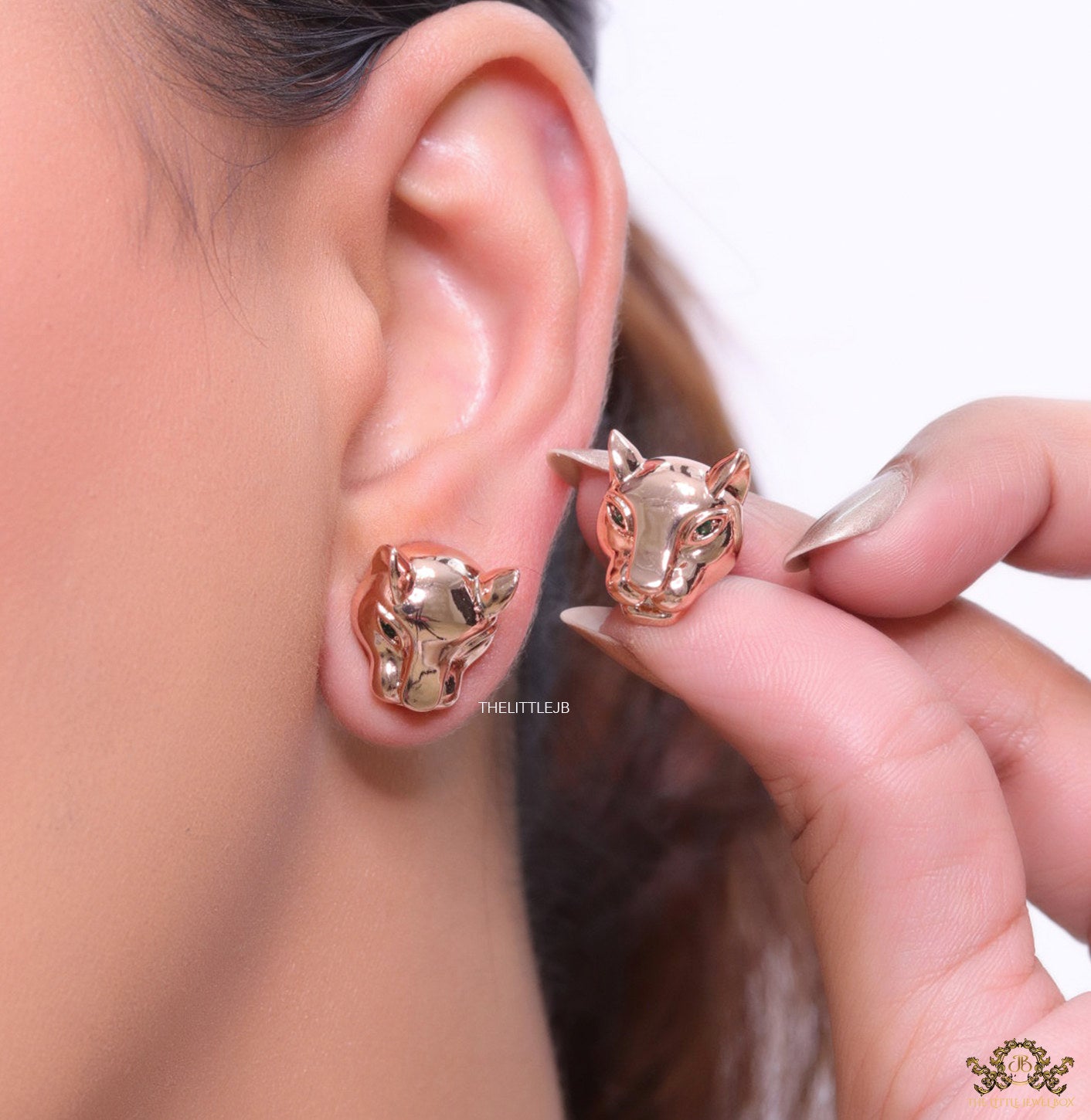Rose gold panther face studs