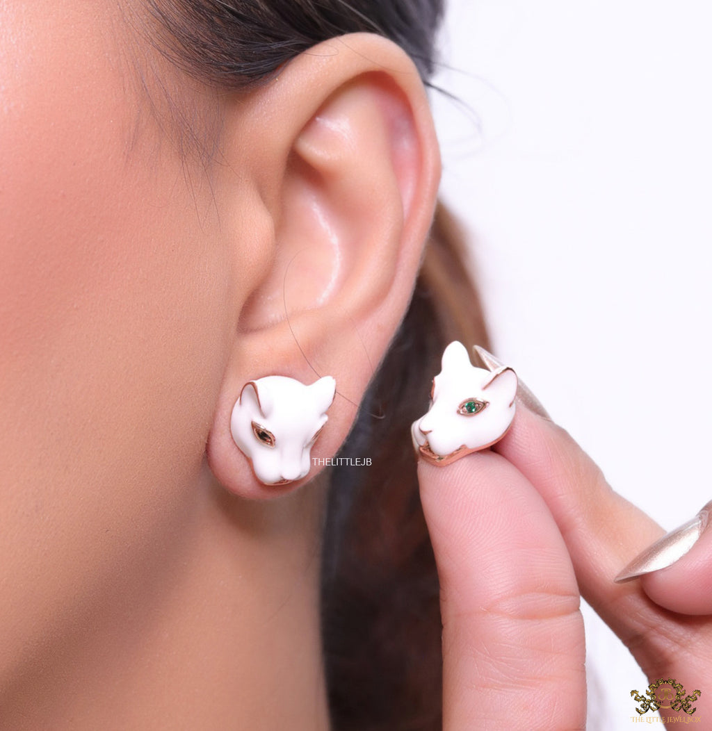 White and rose gold panther face studs