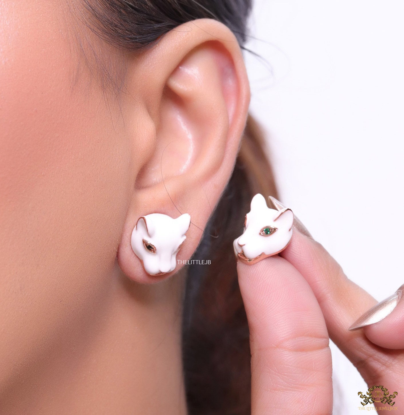 White and rose gold panther face studs