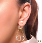 Pearl bomber earrings with cz alphabet initials in drop chains