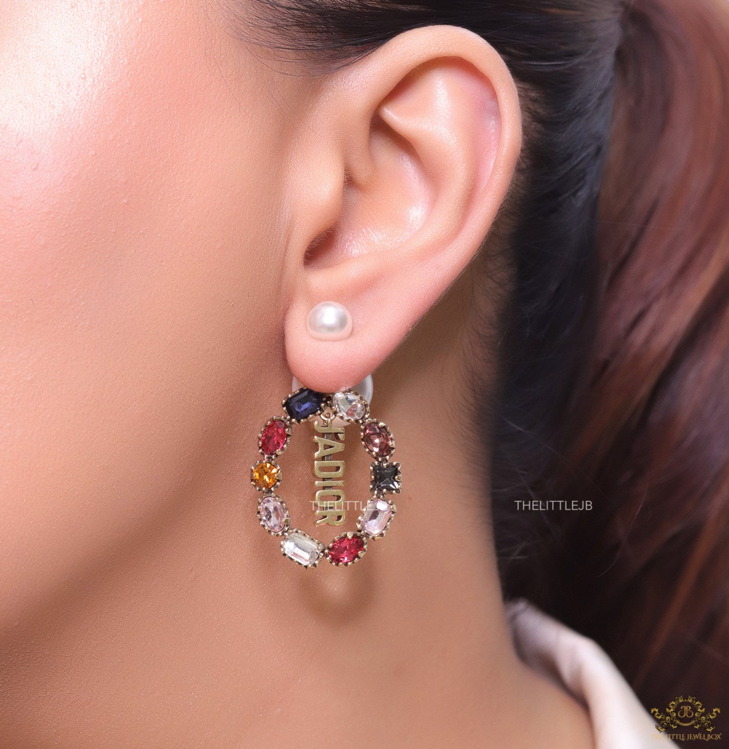 Gold plated pearl bomber earrings with multi cz motif and designer initials