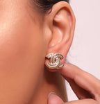 Gold plated twin C motif cz baguette studs