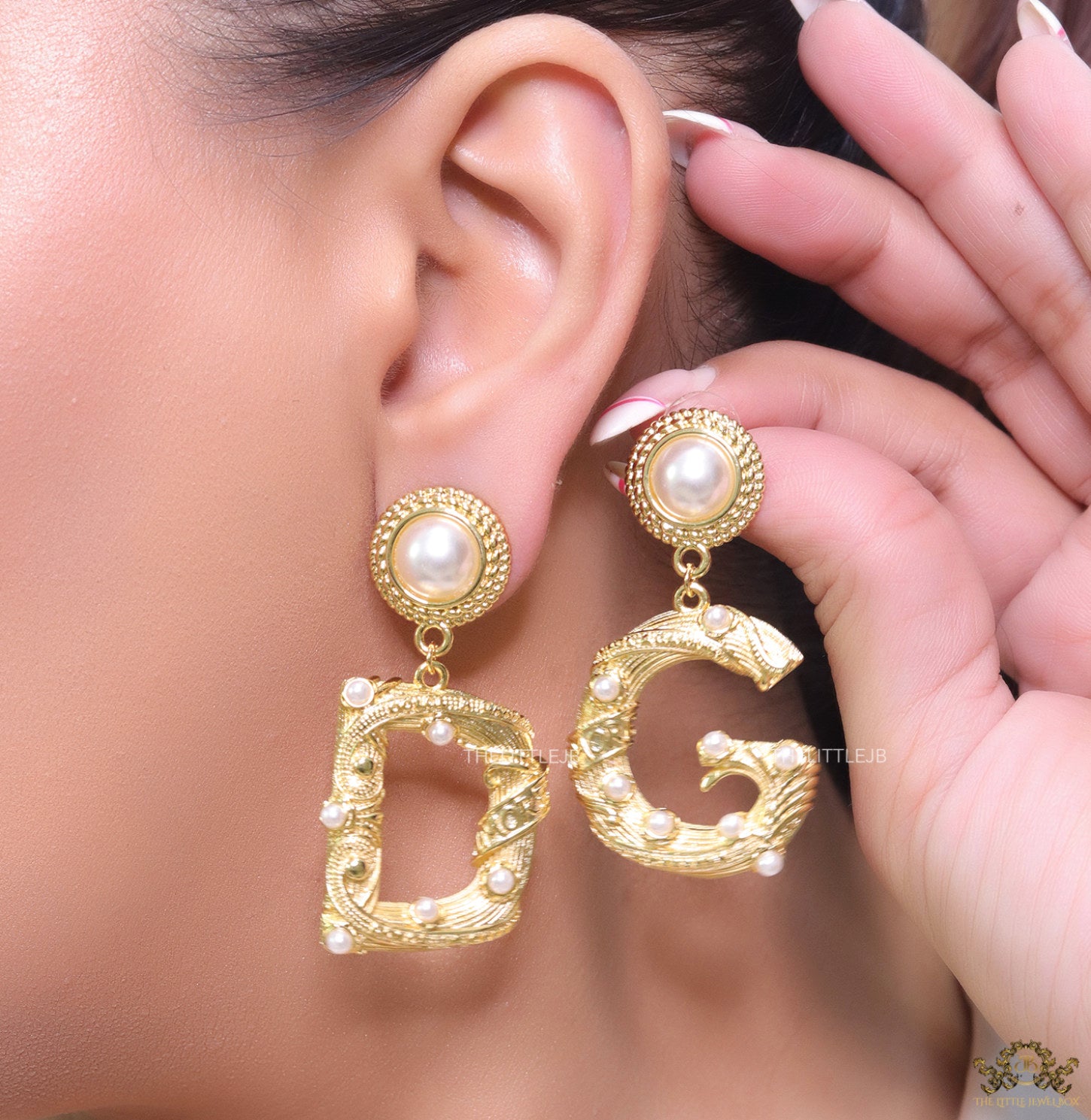 Gold plated alphabet D and G earrings with pearl tops