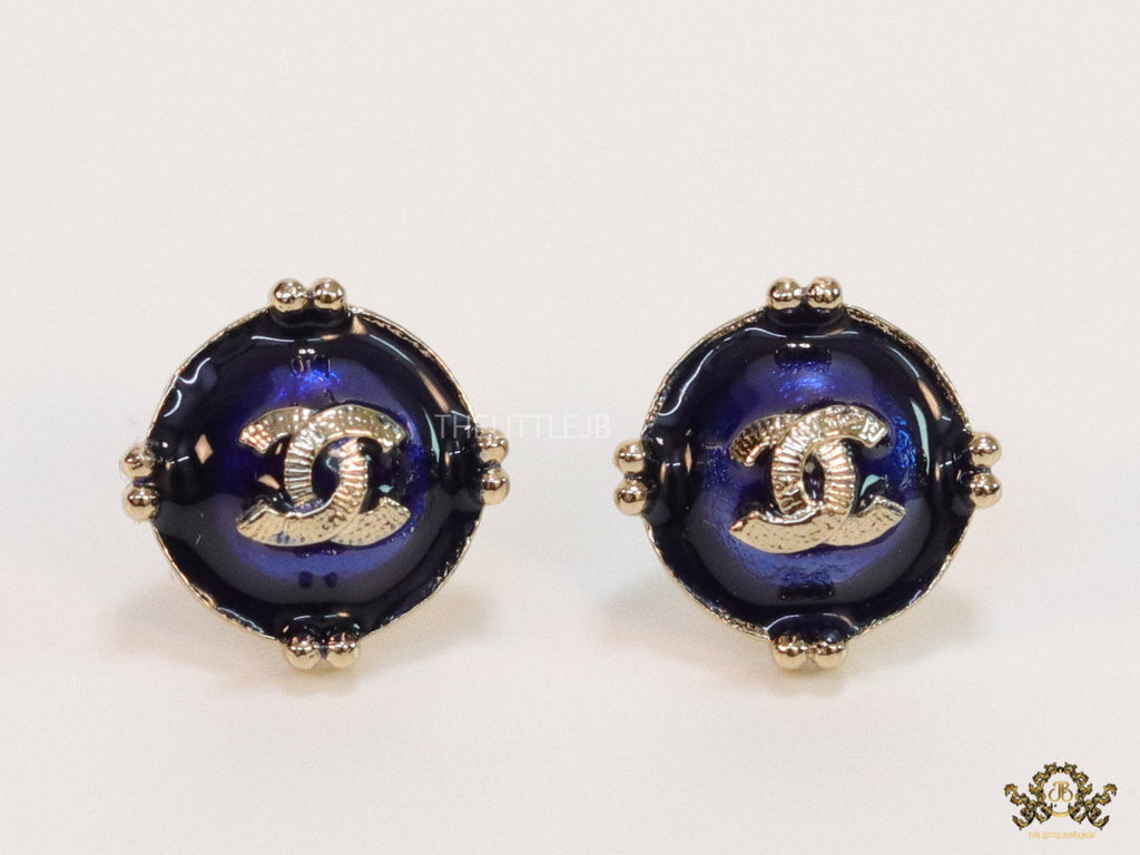 Royal blue studs with double C in centre