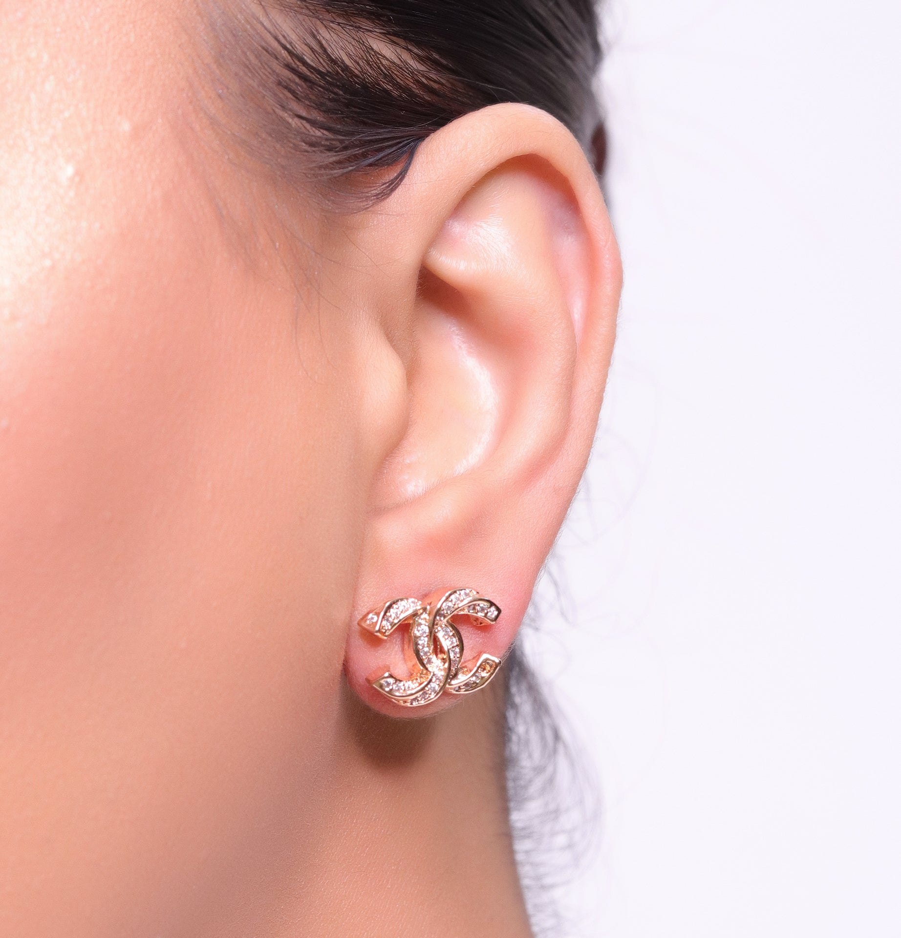 Rose gold plated entwined twin C motif cz studs
