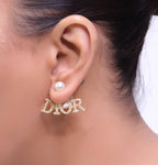 Gold plated alphabet studs in cz and pearl