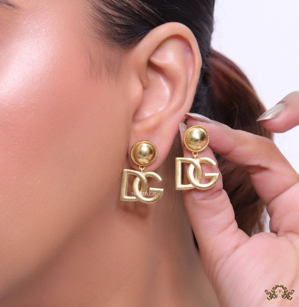 Golden alphabet drop earrings with golden pearl tops