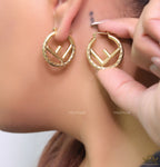Designer golden hoops with alphabet motif