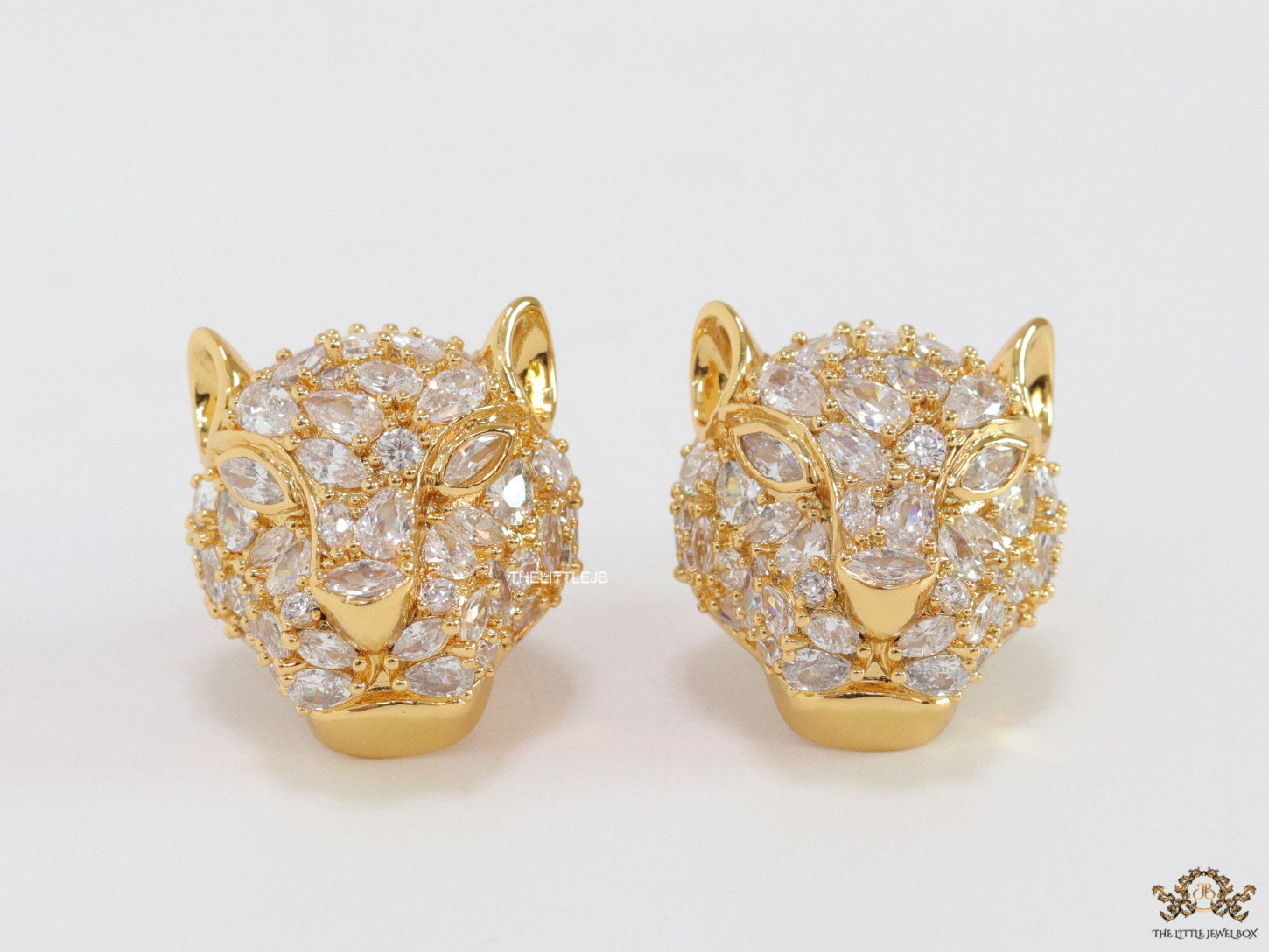 Panther head stud earrings in gold plating and cz