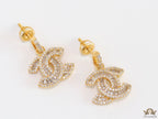 Gold plated cz dangle earrings with twin C motif