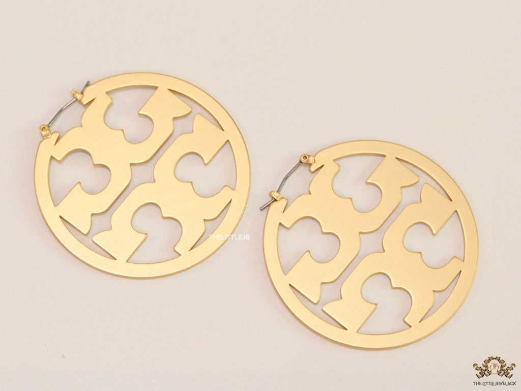 Matt Gold hoops with T motifs