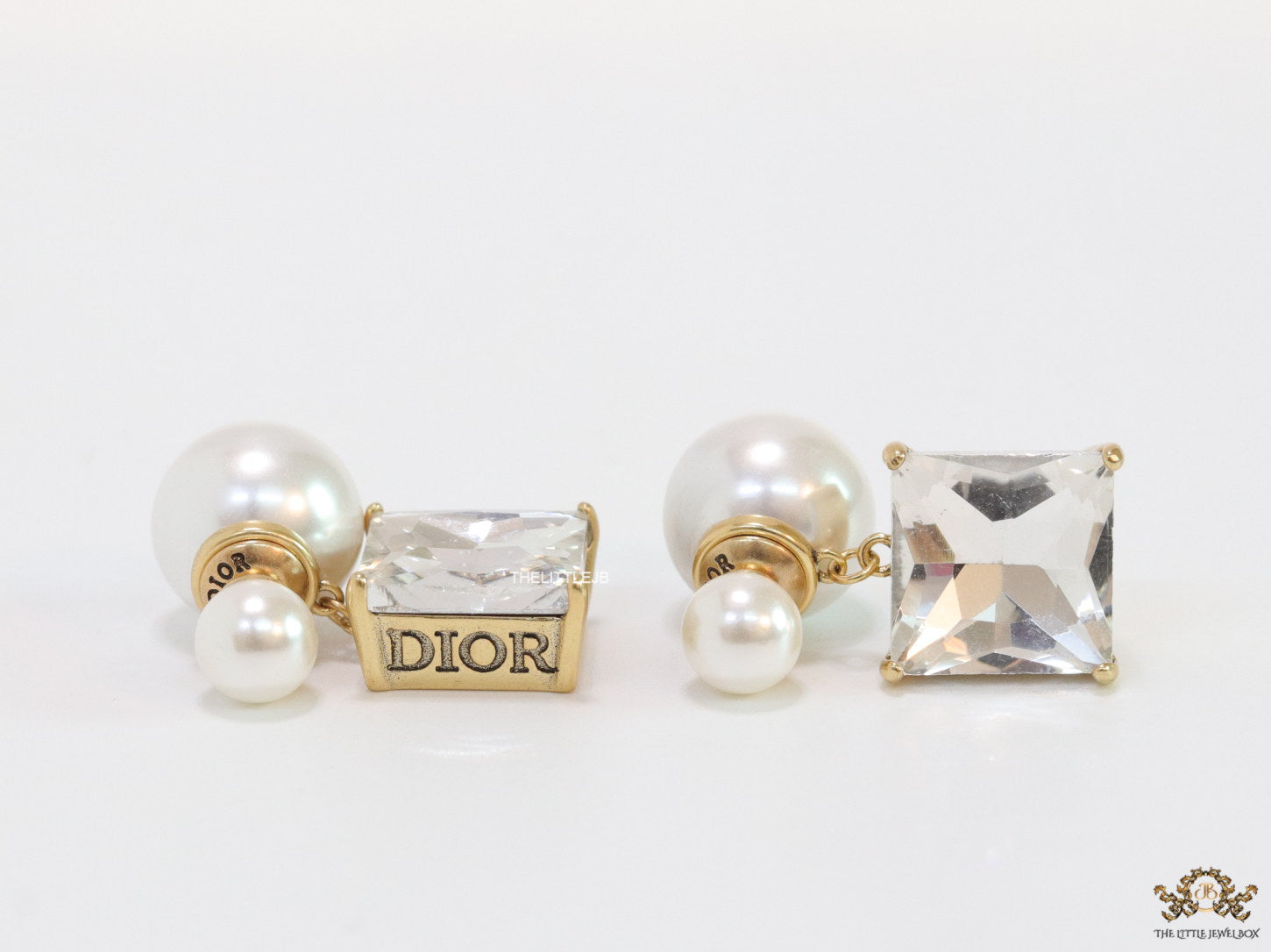Pearl and cz drop earrings in golden finish with alphabets