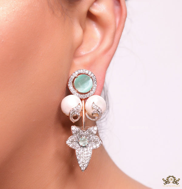 Cz flower earrings with shell pearls and light green stones