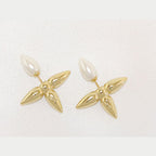 Gold pearl cross studs