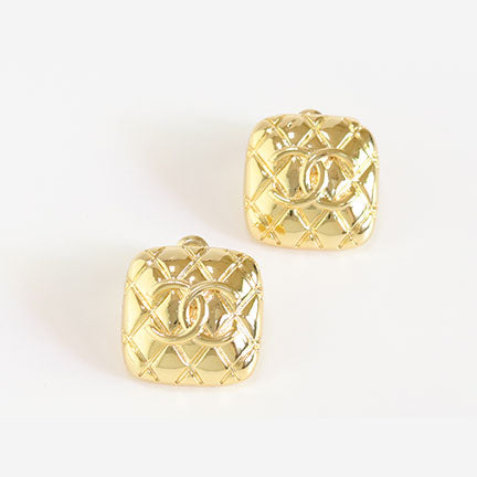 Embossed gold studs