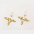 Gold pearl cross studs