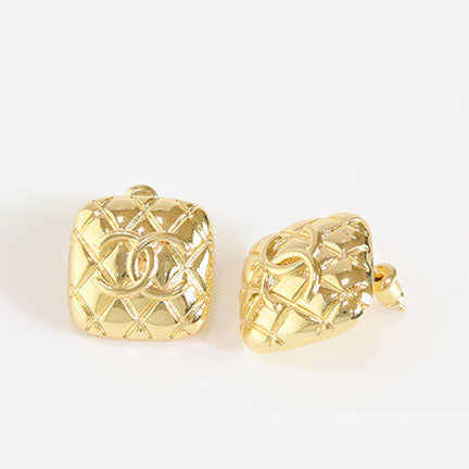 Embossed gold studs