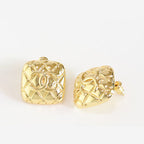 Embossed gold studs