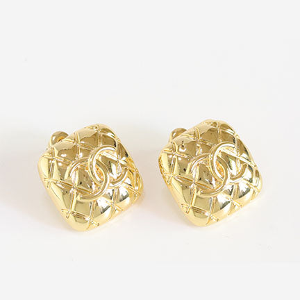 Embossed gold studs
