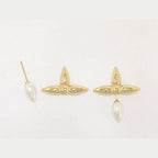 Gold pearl cross studs