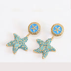 Aqua gold star dangles