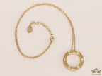 Gold plated disc shape pendant necklace with cz