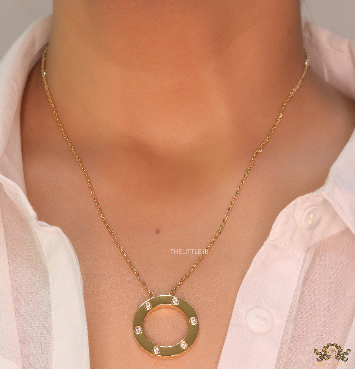 Gold plated disc shape pendant necklace with cz