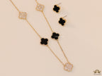 Gold plated necklace set with cz and black enamel coated clovers