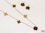 Clover necklace set in black enamel and gold plating