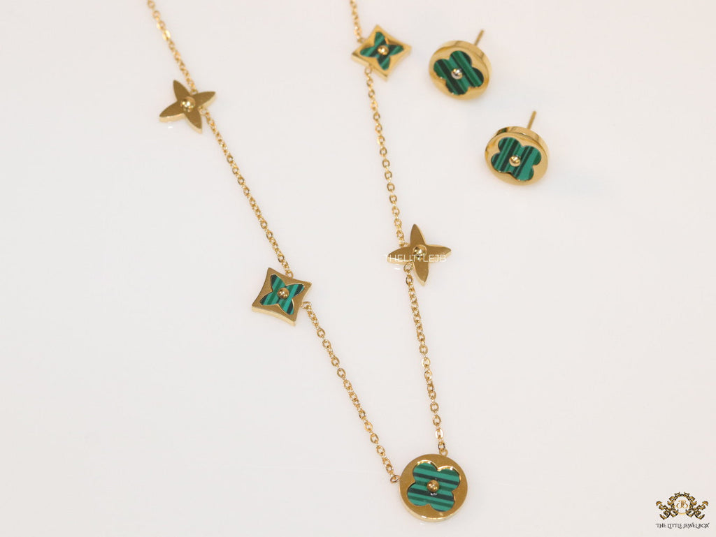 Clover necklace set in green malachite and gold plating