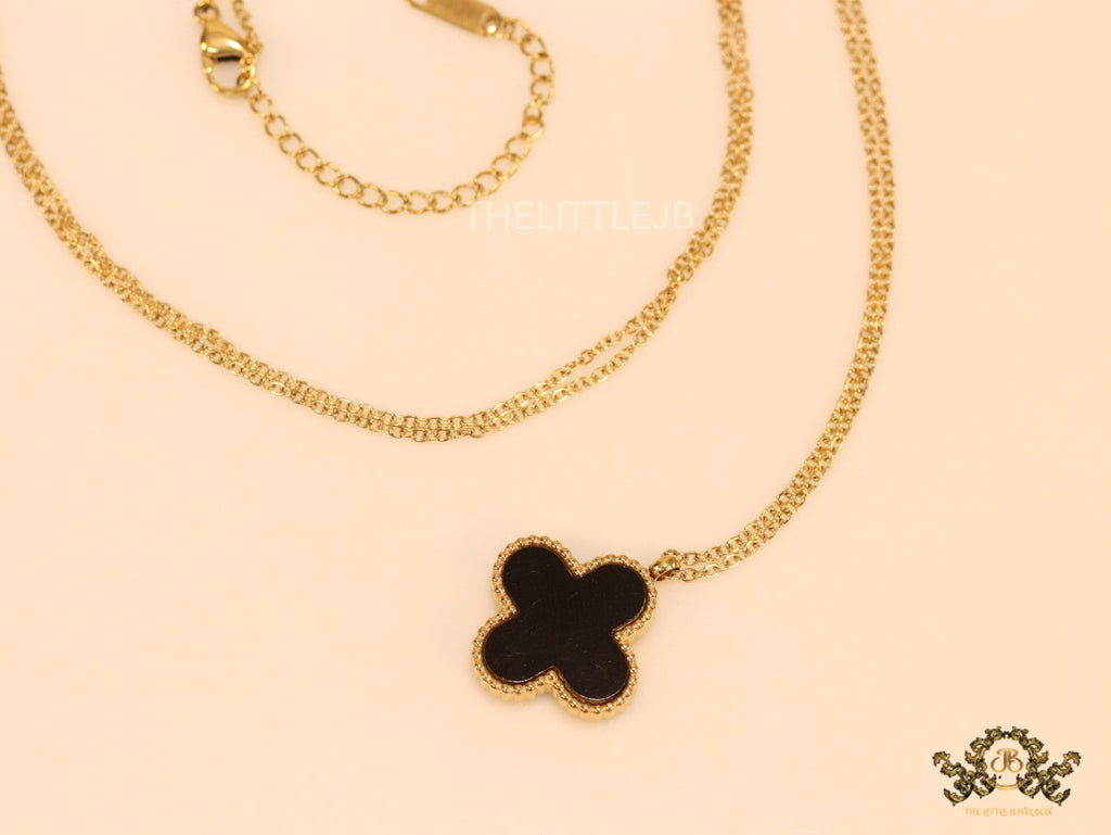 Gold plated chain with black onyx clover pendant