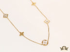 Gold chain necklace with clover motifs