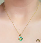 Gold plated necklace with malachite green T motif pendant
