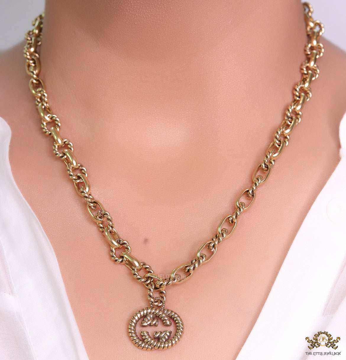 Fancy link chain golden necklace with alphabet pendant