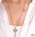 Golden chain necklace with blue clovers studded key pendant