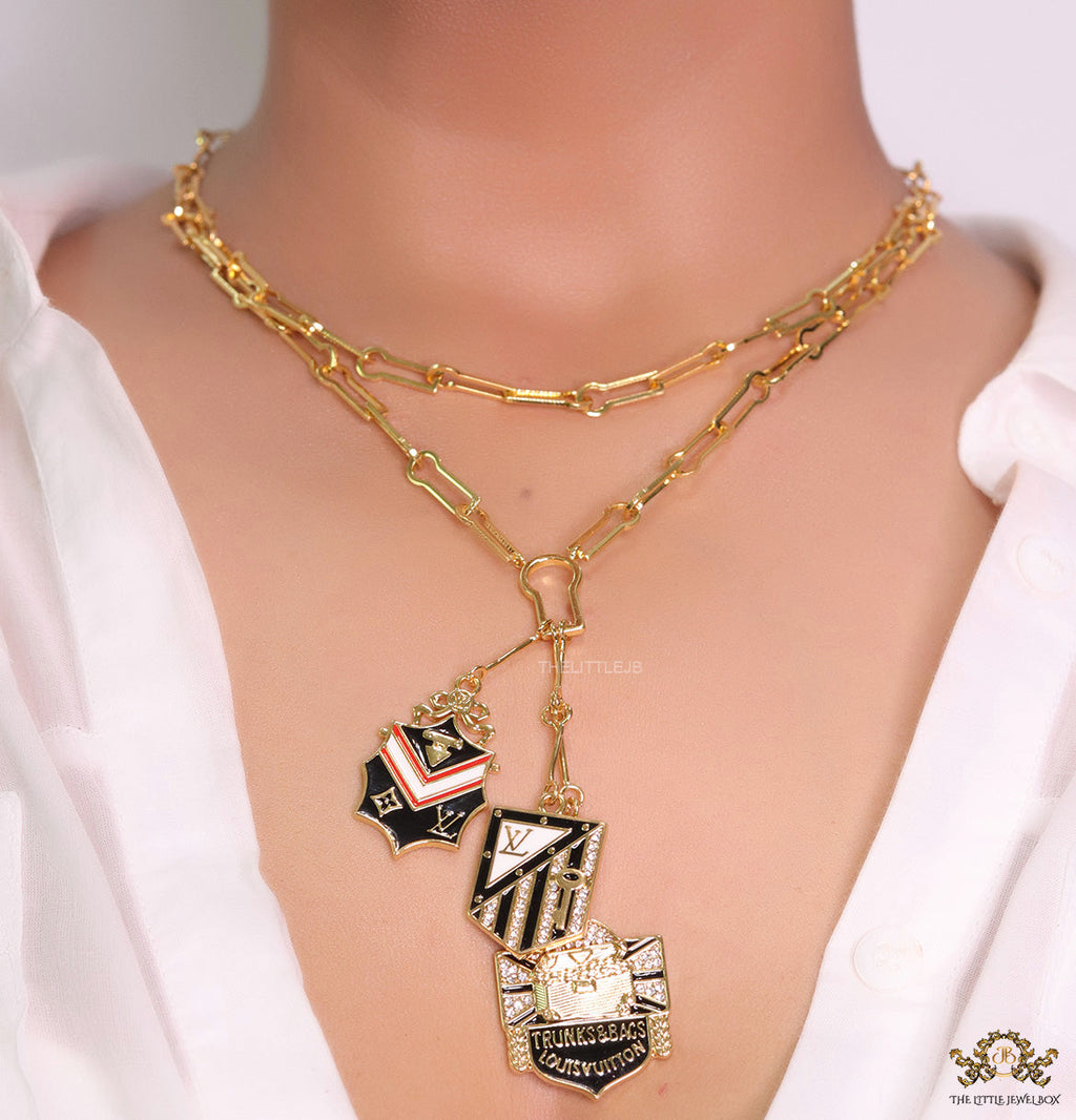 Dual link chain necklace with three in one pendant