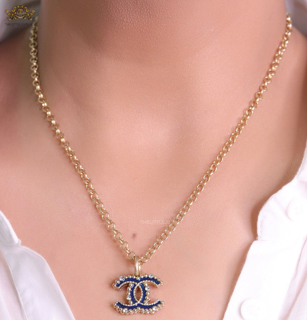 Gold plated link chain necklace with multi colored cz pendant