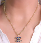 Gold plated link chain necklace with multi colored cz pendant