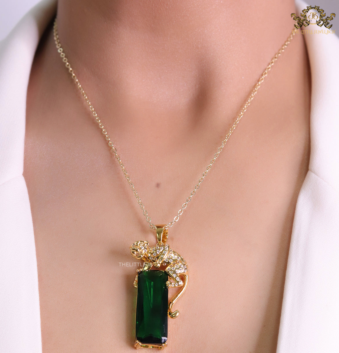 Gold plated leopard on green stone pendant necklace with cz