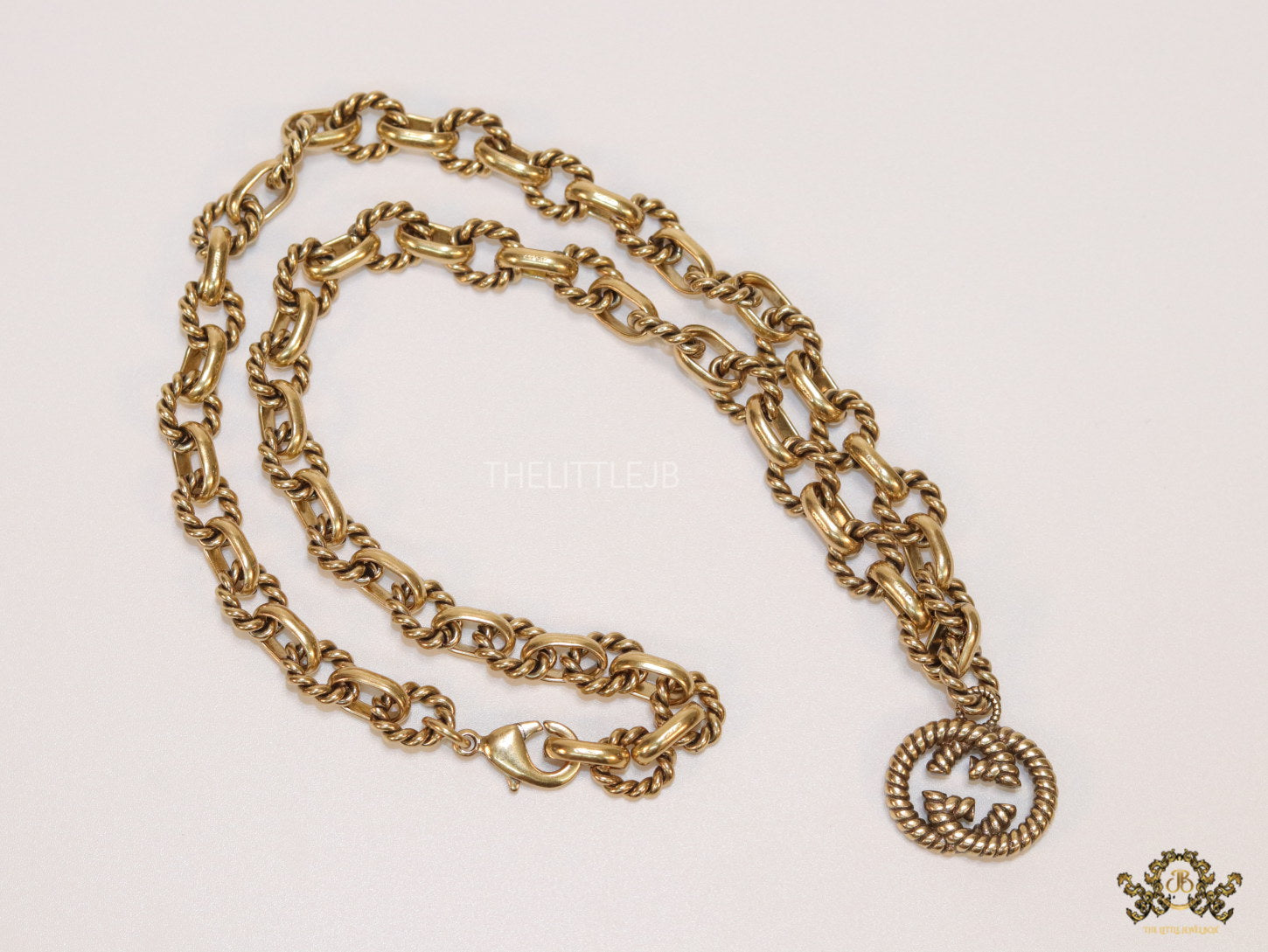 Fancy link chain golden necklace with alphabet pendant