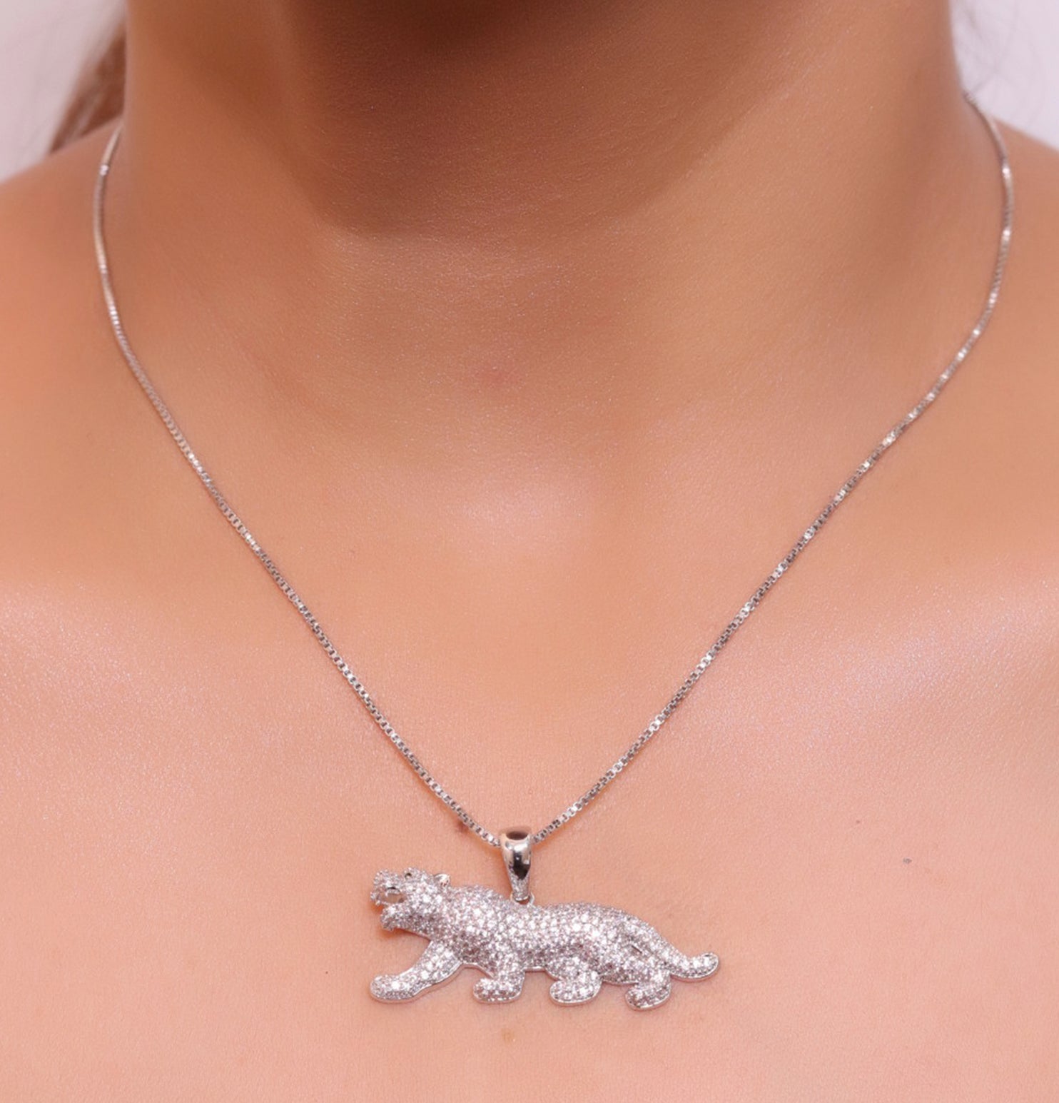 Platinum plated cubic zirconia panther pendant on sleek Platinum plated chain