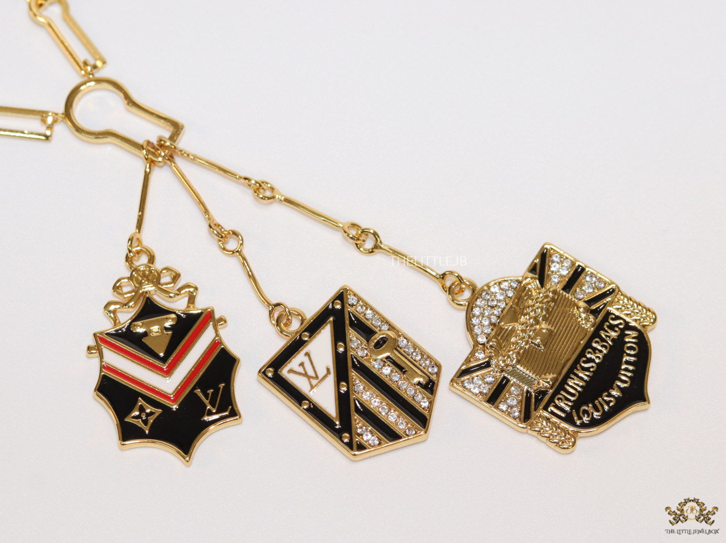 Dual link chain necklace with three in one pendant