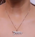 Rose Gold plated cubic zirconia panther pendant on sleek platinum plated chain