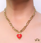 Golden link chain necklace with heart shape lock pendant