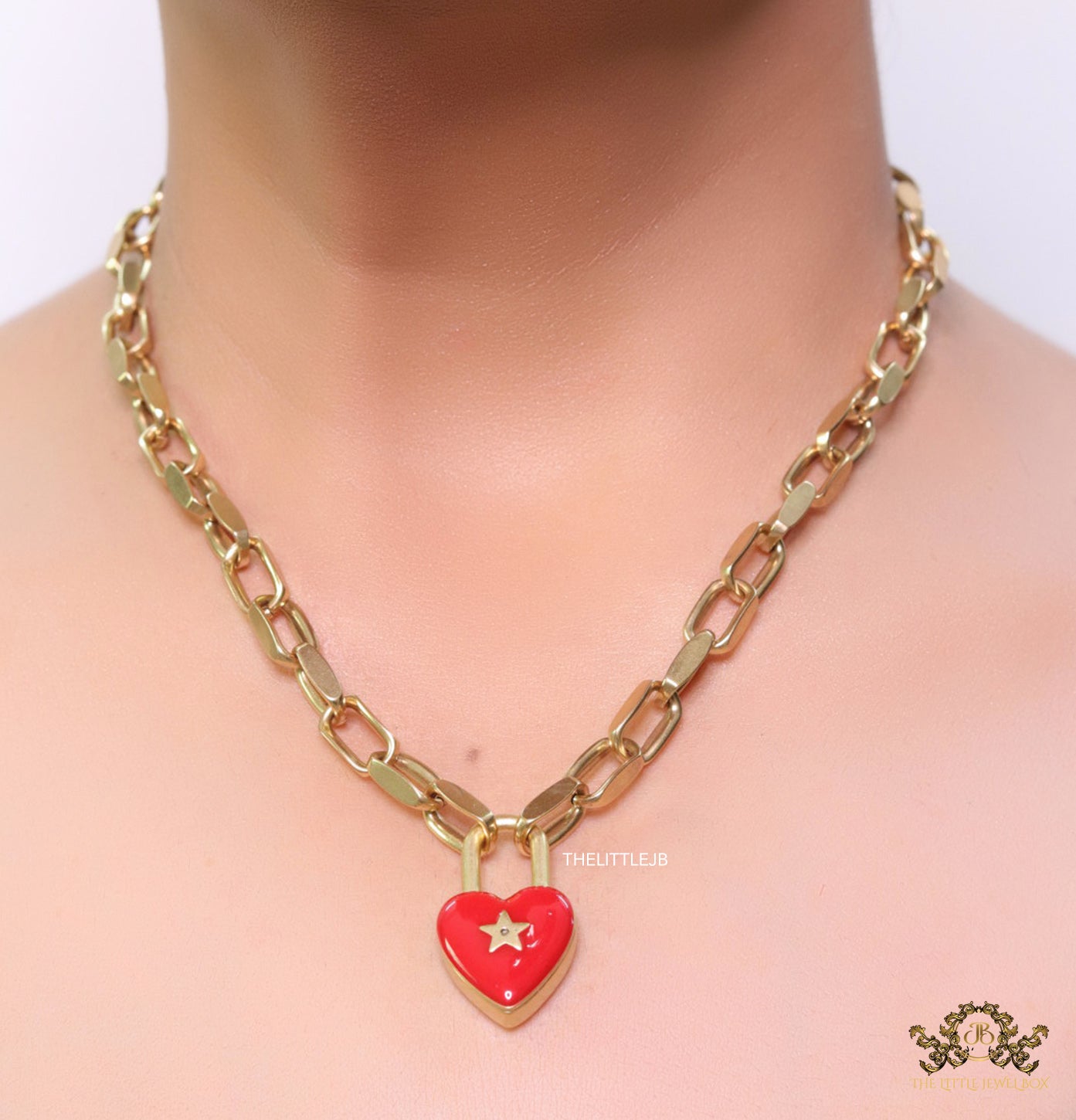 Golden link chain necklace with heart shape lock pendant