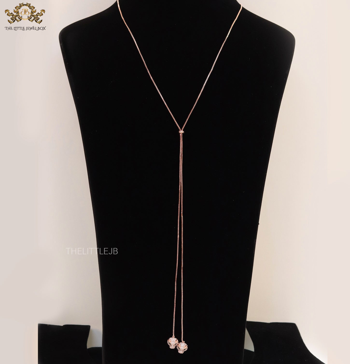 Rose gold plated knot necklace with twin cz panther pendants
