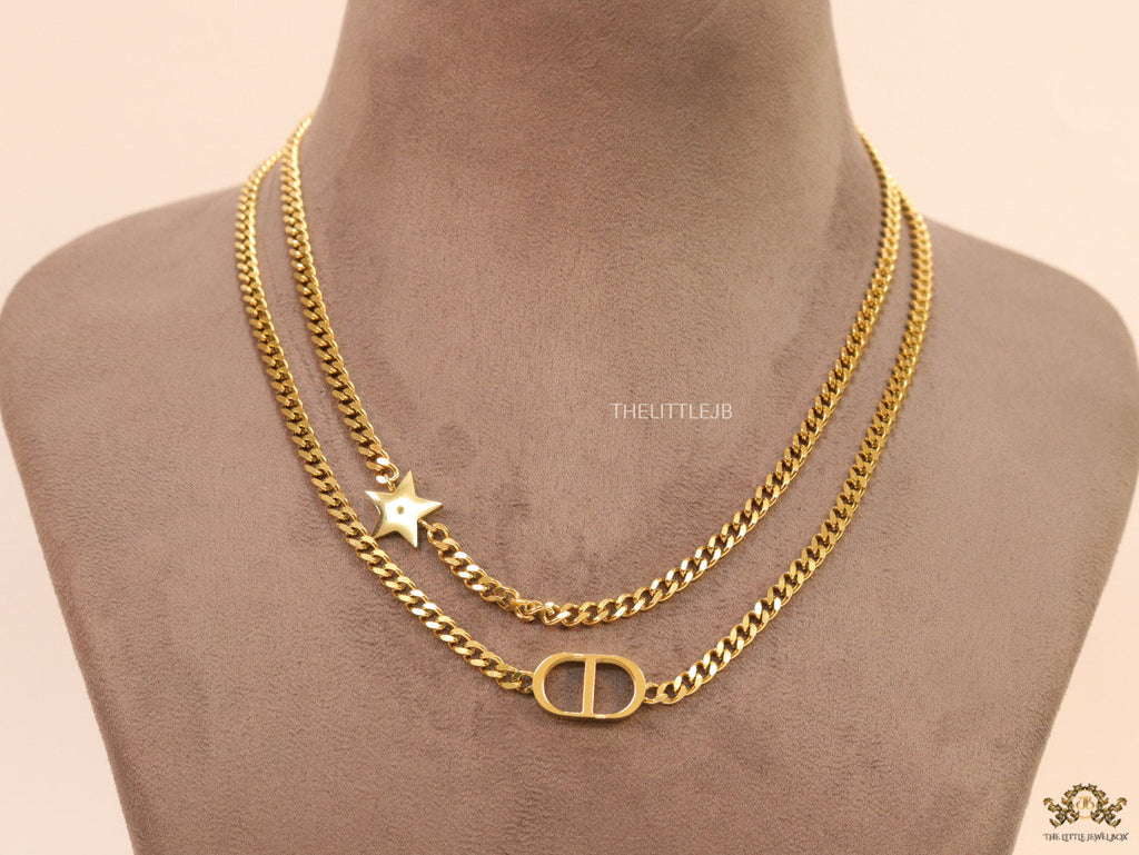 Dual chain necklace with alphabet and star motif