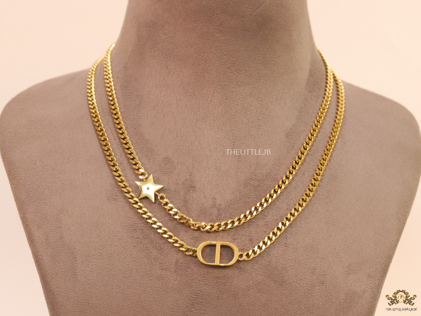 Dual chain necklace with alphabet and star motif