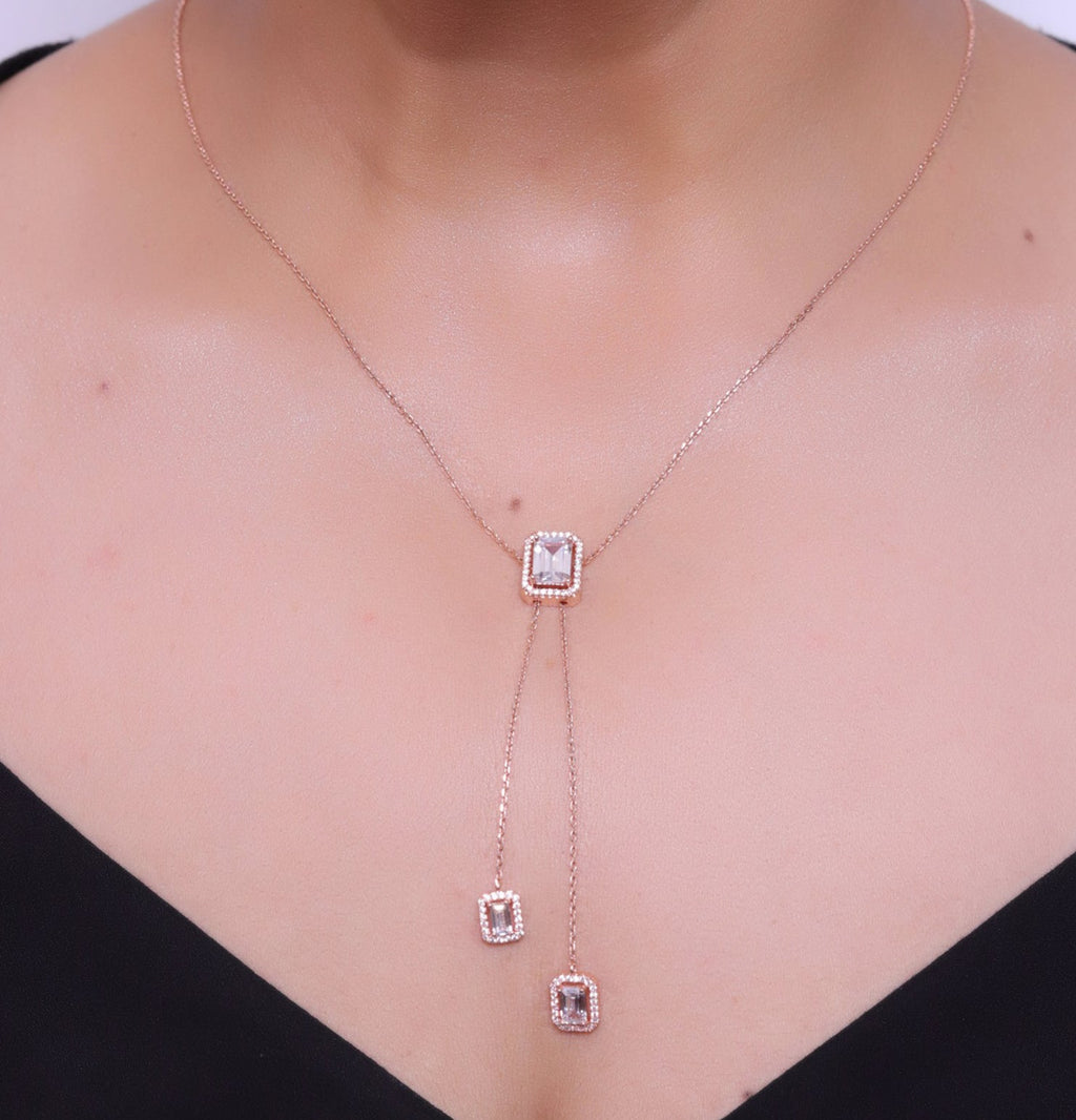 Emerald cut cubic zirconia stones in different sized on sleek rose gold plated chain