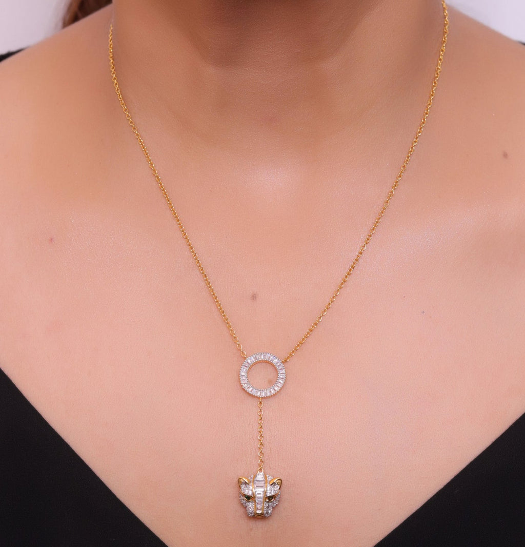 Gold plated sleek chain with circular cubic zirconia disk and gold plated panther face motif pendant
